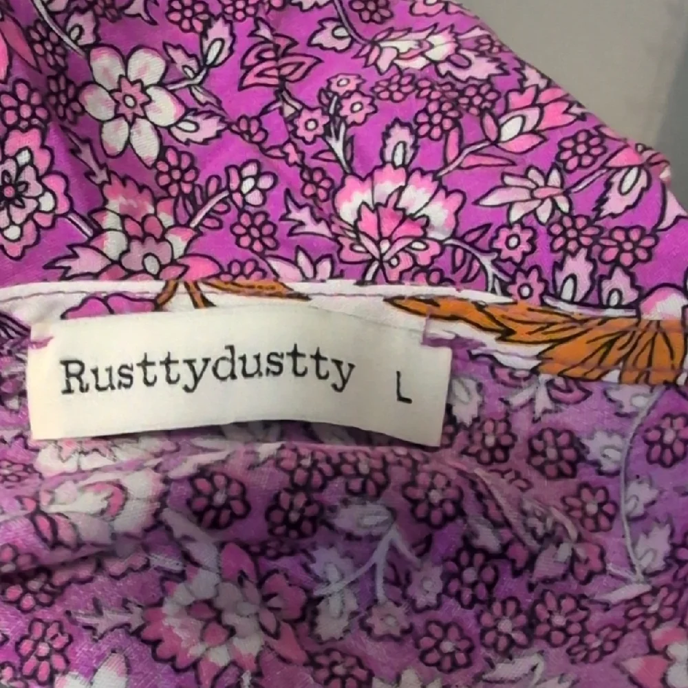 RusttyDustty Purple Floral Cutout Romper EUC - Picture 9 of 9
